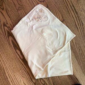 Yellow baby blanket.